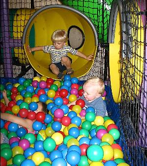 Kids in the ball pit at Chuck E. Cheese's